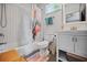 Modern bathroom featuring subway tile, shower-tub, and updated vanity with white cabinets at 670 Parker Ave, Decatur, GA 30032