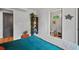 Comfortable bedroom features access to an adjacent, updated bathroom and wood flooring at 670 Parker Ave, Decatur, GA 30032