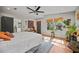 Bright bedroom featuring a ceiling fan, natural lighting, and neutral color palette at 670 Parker Ave, Decatur, GA 30032