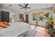 Bedroom with great natural light and stylish furniture, including woven shades and a ceiling fan at 670 Parker Ave, Decatur, GA 30032