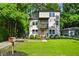 Modern two-story home with a charming front yard and a rooftop deck, perfect for enjoying the outdoors at 670 Parker Ave, Decatur, GA 30032