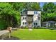 Charming two-story home with a modern design and inviting front yard and a bonus upper deck at 670 Parker Ave, Decatur, GA 30032