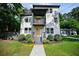 Charming two-story home with modern design, balconies, and inviting entrance at 670 Parker Ave, Decatur, GA 30032