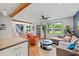 Bright living room boasts hardwood floors, large windows, modern furnishings, and an open concept layout at 670 Parker Ave, Decatur, GA 30032