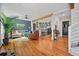 Spacious living room with hardwood floors and an open layout to the kitchen at 670 Parker Ave, Decatur, GA 30032