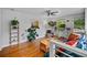 Inviting living room with hardwood floors, large windows, and stylish decor; perfect for relaxation and entertainment at 670 Parker Ave, Decatur, GA 30032