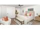 Cozy bedroom featuring a plush bed, neutral tones, and natural light at 1091 Pine St, Conyers, GA 30012