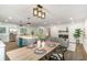 Open-concept home featuring a dining area with modern decor, and lots of natural light at 1091 Pine St, Conyers, GA 30012