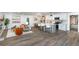 Inviting open-concept home with wood flooring, lots of light, modern decor, and a relaxing living space at 1091 Pine St, Conyers, GA 30012
