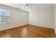 Spacious bedroom with hardwood floors and natural light from windows at 3499 Paces Ferry Se Cir, Smyrna, GA 30080