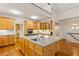 Gourmet kitchen featuring custom cabinets, stone countertops, and stainless steel appliances at 3499 Paces Ferry Se Cir, Smyrna, GA 30080