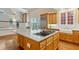 Bright kitchen with a large island, stainless steel appliances and hardwood floors at 3499 Paces Ferry Se Cir, Smyrna, GA 30080