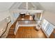 Lofted view of the living room featuring a piano and lots of windows at 3499 Paces Ferry Se Cir, Smyrna, GA 30080