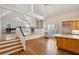 Spacious open-concept living area with hardwood floors, high ceilings, and abundant natural light at 3499 Paces Ferry Se Cir, Smyrna, GA 30080