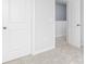 Hallway with multiple doors and carpet at 407 Newland Way, Acworth, GA 30102