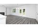 Bright living area with fireplace and access to backyard through glass doors at 407 Newland Way, Acworth, GA 30102