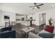 New home living room with dining area, kitchen, dark hardwood flooring, and recessed lighting at 407 Newland Way, Acworth, GA 30102