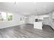 Open living area with eat-in kitchen and backyard access, perfect for entertaining at 407 Newland Way, Acworth, GA 30102