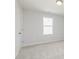 Room with carpet, light fixtures and door at 407 Newland Way, Acworth, GA 30102