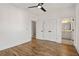 Bedroom featuring wood floors, and doorway leading to the bathroom at 1836 Memorial Dr # 303, Atlanta, GA 30317