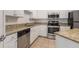 Bright kitchen with stainless steel appliances, granite counters, and abundant cabinet space for storage at 1850 Cotillion Dr # 4218, Atlanta, GA 30338