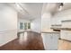 Spacious living room with hardwood floors and access to a balcony with natural light at 1850 Cotillion Dr # 4218, Atlanta, GA 30338