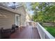 Well-maintained deck with comfortable seating, offering a great view of the backyard at 4856 Saddlerun Ln, Powder Springs, GA 30127