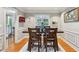 Formal dining room with hardwood floors and wainscoting at 4856 Saddlerun Ln, Powder Springs, GA 30127
