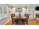 Elegant dining area with hardwood floors and natural light at 4856 Saddlerun Ln, Powder Springs, GA 30127