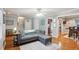 Bright living room features hardwood floors and neutral paint at 4856 Saddlerun Ln, Powder Springs, GA 30127