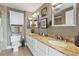 Bright bathroom features dual sinks, granite countertops, and modern fixtures at 3481 Lakeside Ne Dr # 1103, Atlanta, GA 30326