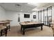 Bright game room features a billiard table, tv, and comfortable seating at 3481 Lakeside Ne Dr # 1103, Atlanta, GA 30326