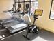 Fitness center featuring stationary bikes and treadmills in a bright setting at 3481 Lakeside Ne Dr # 1103, Atlanta, GA 30326