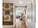 Hallway with wood floors that leads to the open living area and front door at 3481 Lakeside Ne Dr # 1103, Atlanta, GA 30326