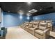 This home theater is designed with cozy leather reclining chairs, a projector and screen for an immersive experience at 3481 Lakeside Ne Dr # 1103, Atlanta, GA 30326
