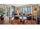 Cozy living room with hardwood floors, comfortable seating, and sliding door to the balcony at 3481 Lakeside Ne Dr # 1103, Atlanta, GA 30326