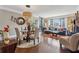 Inviting living room and dining area with hardwood floors and large windows at 3481 Lakeside Ne Dr # 1103, Atlanta, GA 30326