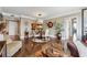 Open floor plan featuring a living room, dining area, and view into the kitchen at 3481 Lakeside Ne Dr # 1103, Atlanta, GA 30326