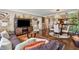 Open-concept living space with combined living room, dining area, and kitchen bar at 3481 Lakeside Ne Dr # 1103, Atlanta, GA 30326