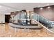 Grand lobby area with elegant staircase, seating, and marble flooring at 3481 Lakeside Ne Dr # 1103, Atlanta, GA 30326