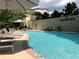 Inviting outdoor pool area with lounge chairs and lush landscaping at Grandview at 3481 Lakeside Ne Dr # 1103, Atlanta, GA 30326