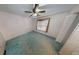 Simple bedroom with ceiling fan, window, and closet at 365 Falling Creek Bnd, Duluth, GA 30097