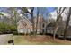 Charming brick home with mature trees and a well-manicured lawn at 365 Falling Creek Bnd, Duluth, GA 30097