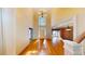 Bright foyer with hardwood floors, chandelier and a high ceiling at 365 Falling Creek Bnd, Duluth, GA 30097