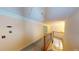 Bright hallway with white accents and a stairway to the bottom floor at 365 Falling Creek Bnd, Duluth, GA 30097