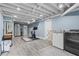 Finished basement offering a gym area and laundry facilities at 4855 Kendall Ct, Atlanta, GA 30342