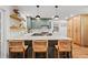 Stylish kitchen featuring a large island with seating, modern appliances, and elegant finishes for a contemporary feel at 4855 Kendall Ct, Atlanta, GA 30342