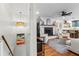 Open concept living room with fireplace and view of the kitchen at 4855 Kendall Ct, Atlanta, GA 30342