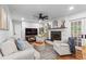 Bright living room with fireplace and view of the back deck at 4855 Kendall Ct, Atlanta, GA 30342