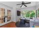 Charming screened-in porch with comfortable seating, a ceiling fan, and views of the outdoors at 4855 Kendall Ct, Atlanta, GA 30342